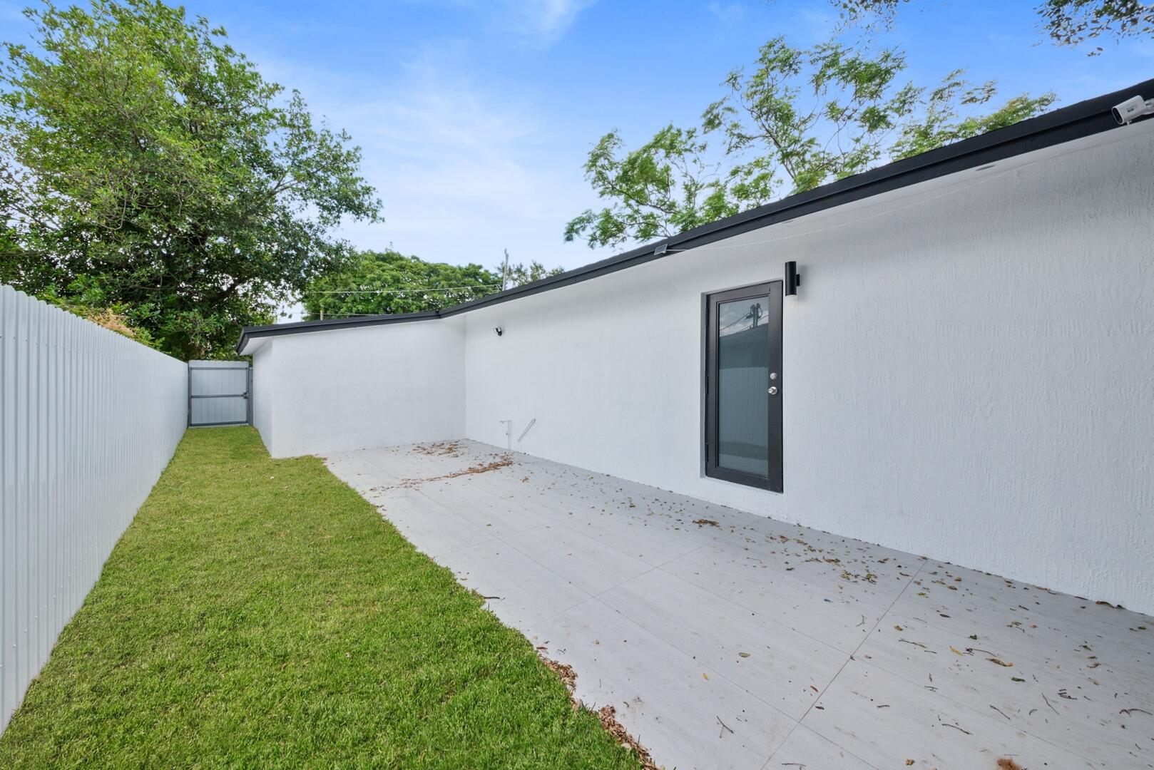 860 Northwest 70th Street Miami, FL 33150 - Photo 17 of 25 a view of a backyard