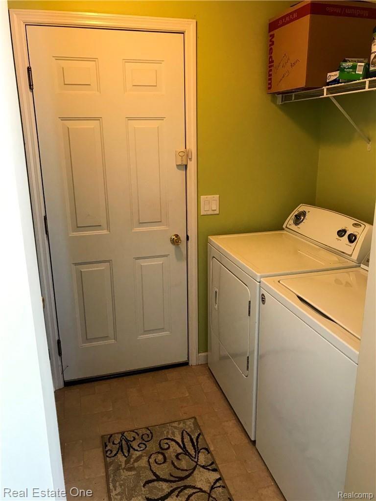 249 North Kane Road Webberville, MI 48892 - Photo 15 of 23 First floor laundry off of garage