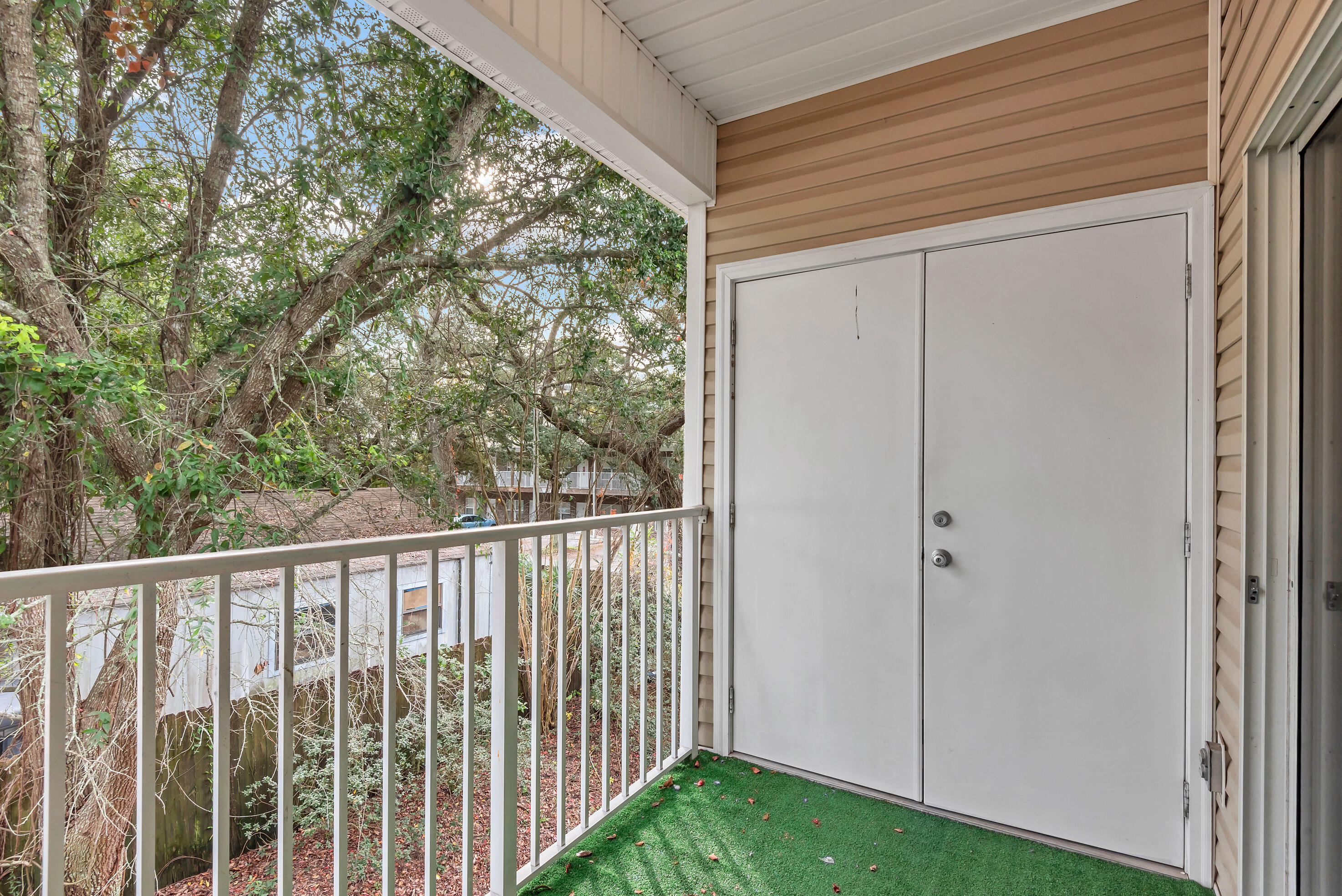 936 Barrow Street, Unit 7 Fort Walton Beach, FL 32547 - Photo 9 of 9 a view of a balcony with yard