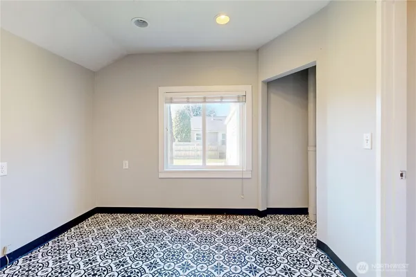 an empty room with window