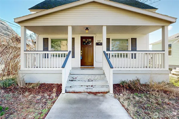front view of a house with a small yard