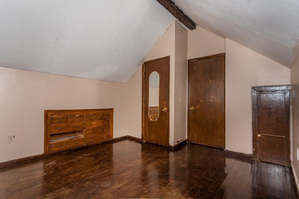 59 Weyham Road Weymouth, MA 02191 - Photo 8 of 18 a view of an empty room and wooden floor