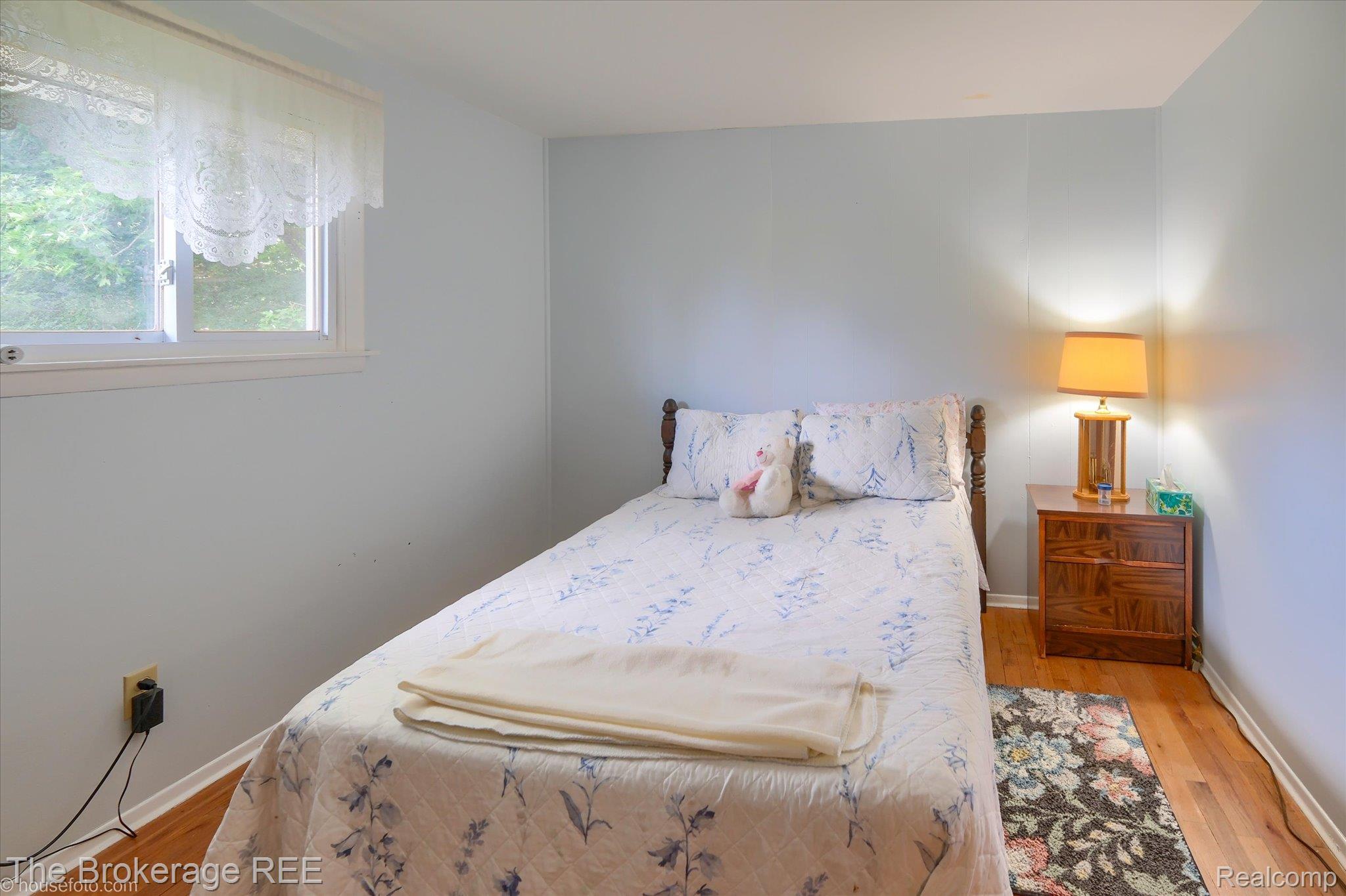 6129 East Lake Road Millington, MI 48746 - Photo 22 of 47 Bedroom featuring light wood-style flooring