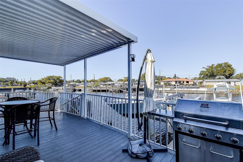 5309 Boardwalk Street Holiday, FL 34690 - Photo 21 of 50 a view of a terrace with furniture