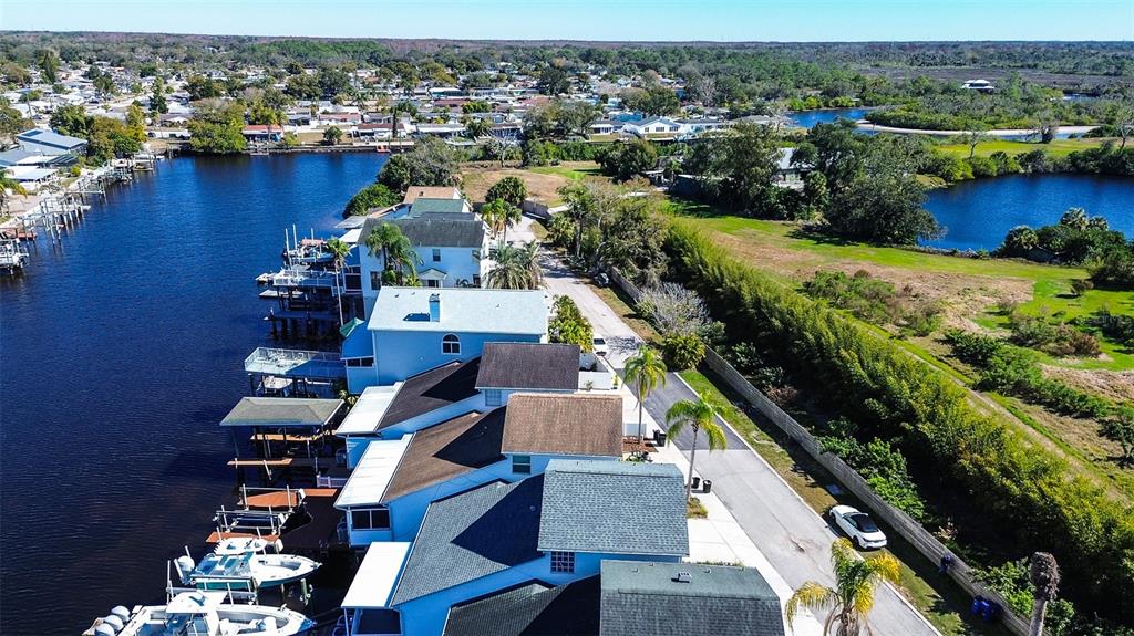 5309 Boardwalk Street Holiday, FL 34690 - Photo 42 of 50 an aerial view of residential houses with outdoor space