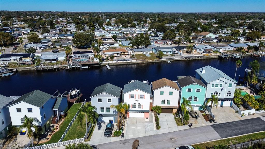 5309 Boardwalk Street Holiday, FL 34690 - Photo 46 of 50 an aerial view of a house with outdoor space swimming pool and ocean view