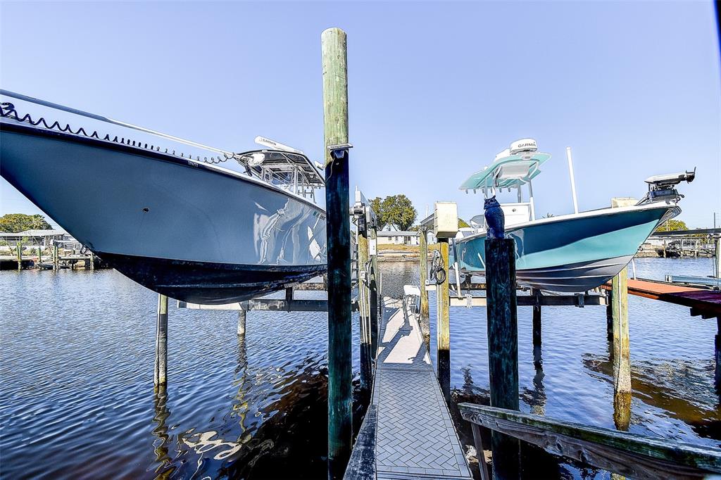 5309 Boardwalk Street Holiday, FL 34690 - Photo 49 of 50 a living room with furniture and wooden floor