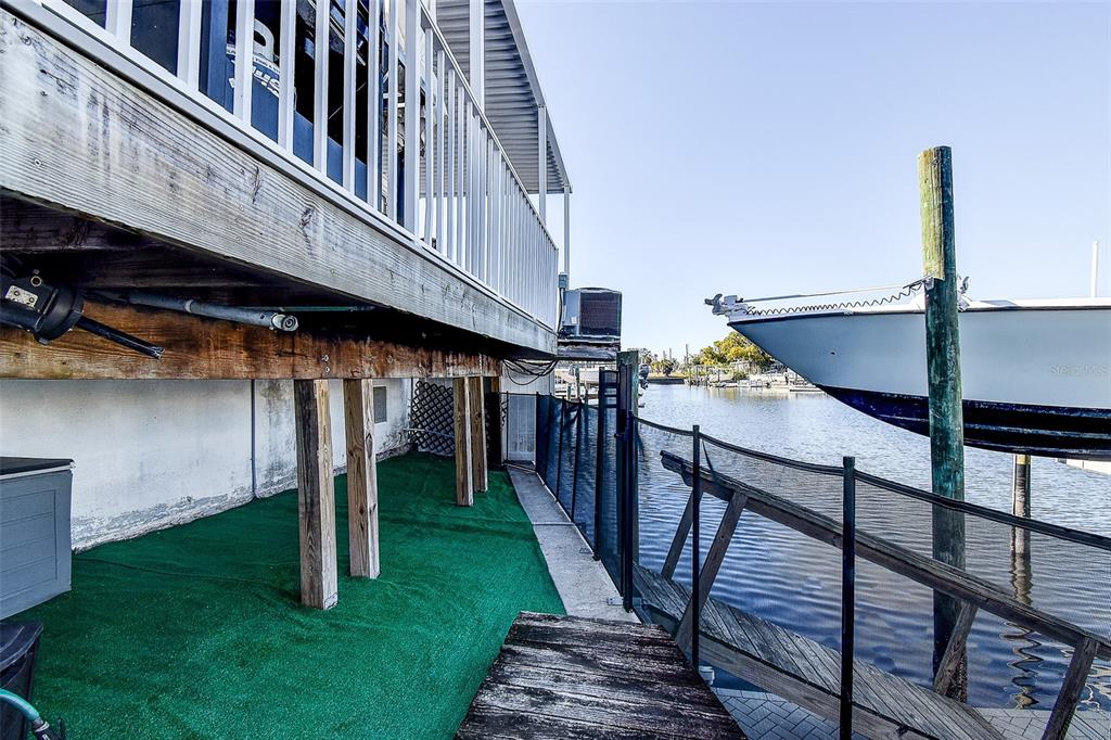 5309 Boardwalk Street Holiday, FL 34690 - Photo 50 of 50 a view of house with backyard and deck