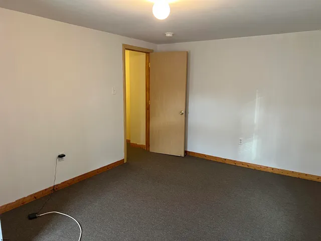 an empty room with a door