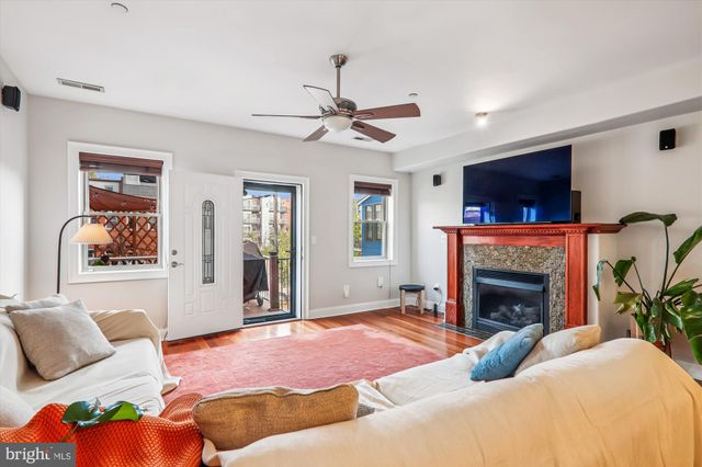 a bedroom with a bed and a fireplace