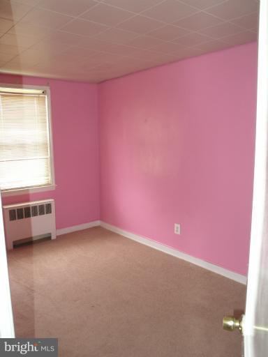 3702 Greenvale Road Baltimore, MD 21229 - Photo 6 of 15 an empty room with a window