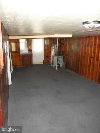 3702 Greenvale Road Baltimore, MD 21229 - Photo 9 of 15 an empty room with windows