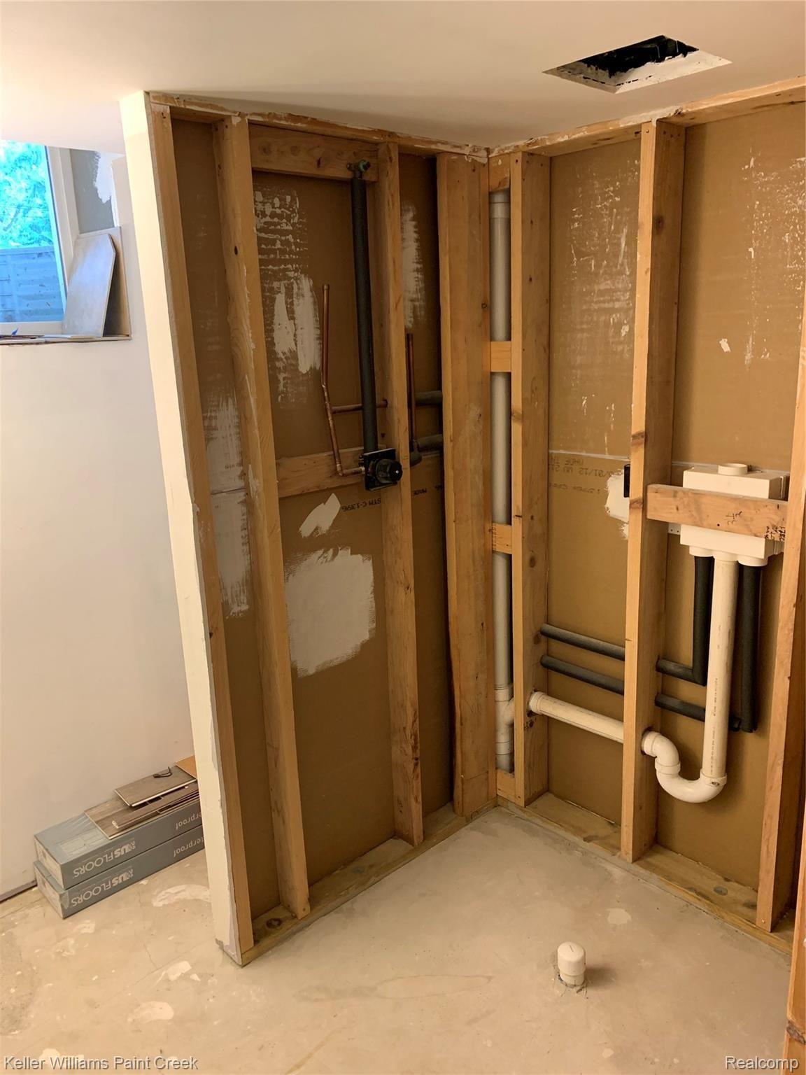 132 Brewster Road Rochester, MI 48309 - Photo 30 of 32 A LARGE BATHROOM (7 X 9) IN THE BASEMENT HAS BEEN ROUGHED" IN. THE PLUMBING & WATER FOR LARGE SHOWER, SINK & TOILET HAVE BEEN INSTALLED. THE ELECTRICAL HAS BEEN INSTALLED & THE CEILING & WALLS HAVE BEEN DRYWALLED
