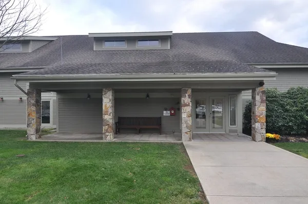 a view of a house with a porch