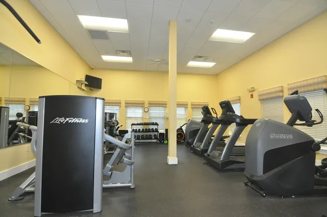 a view of a room with gym equipment
