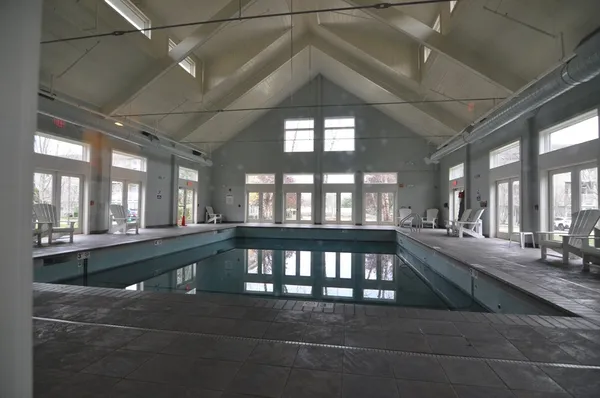 a view of a living room and chandelier