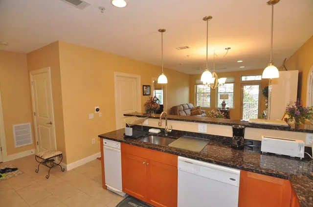a kitchen with sink and window