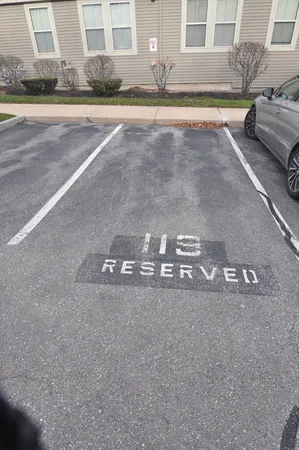 a view of a swimming pool and a yard