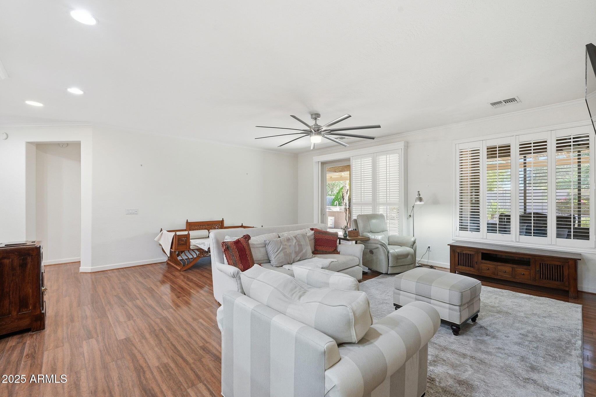 5161 North Scottsdale Road Eloy, AZ 85131 - Photo 11 of 58 a living room with furniture and large windows