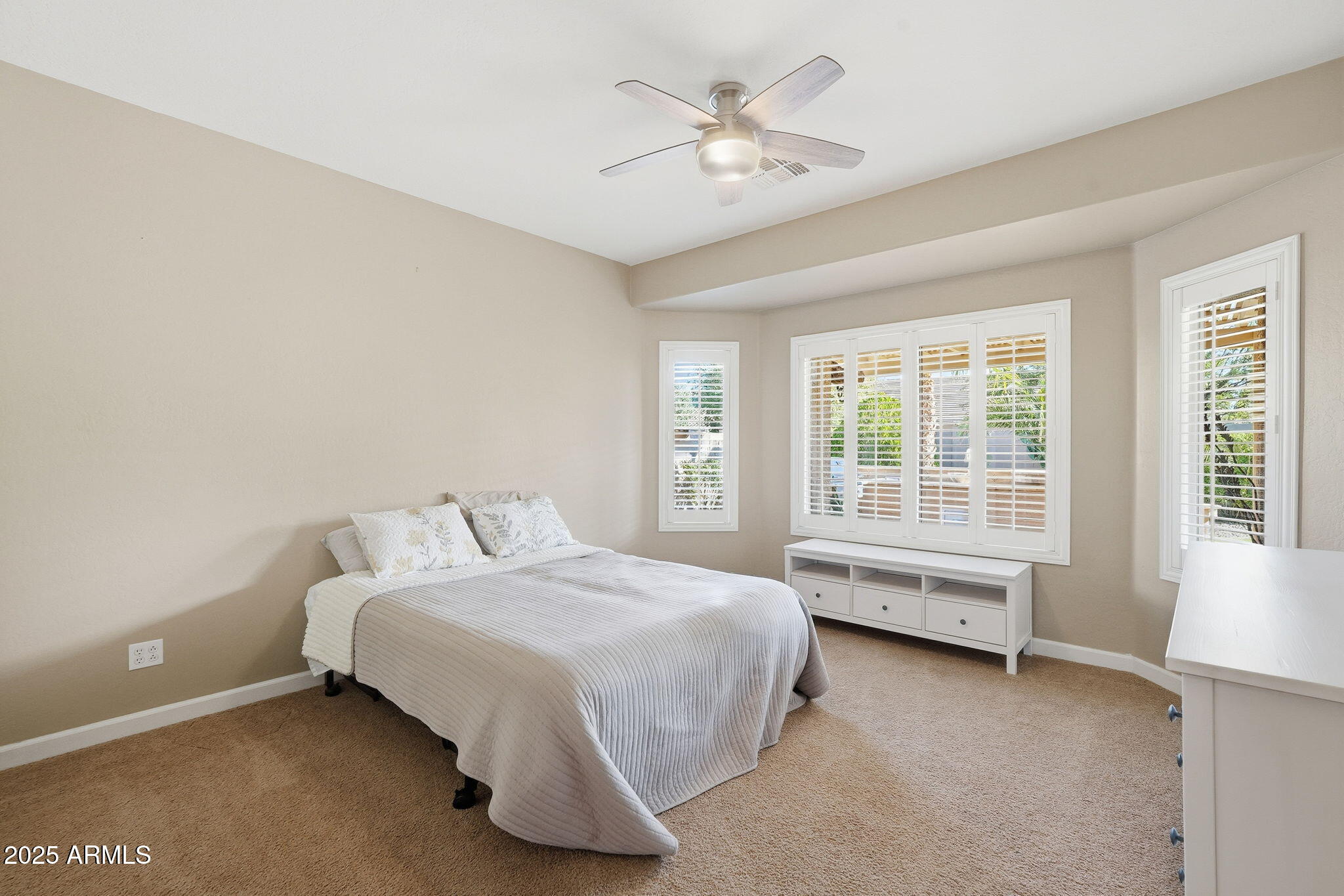 5161 North Scottsdale Road Eloy, AZ 85131 - Photo 28 of 58 a bedroom with a bed and a chair