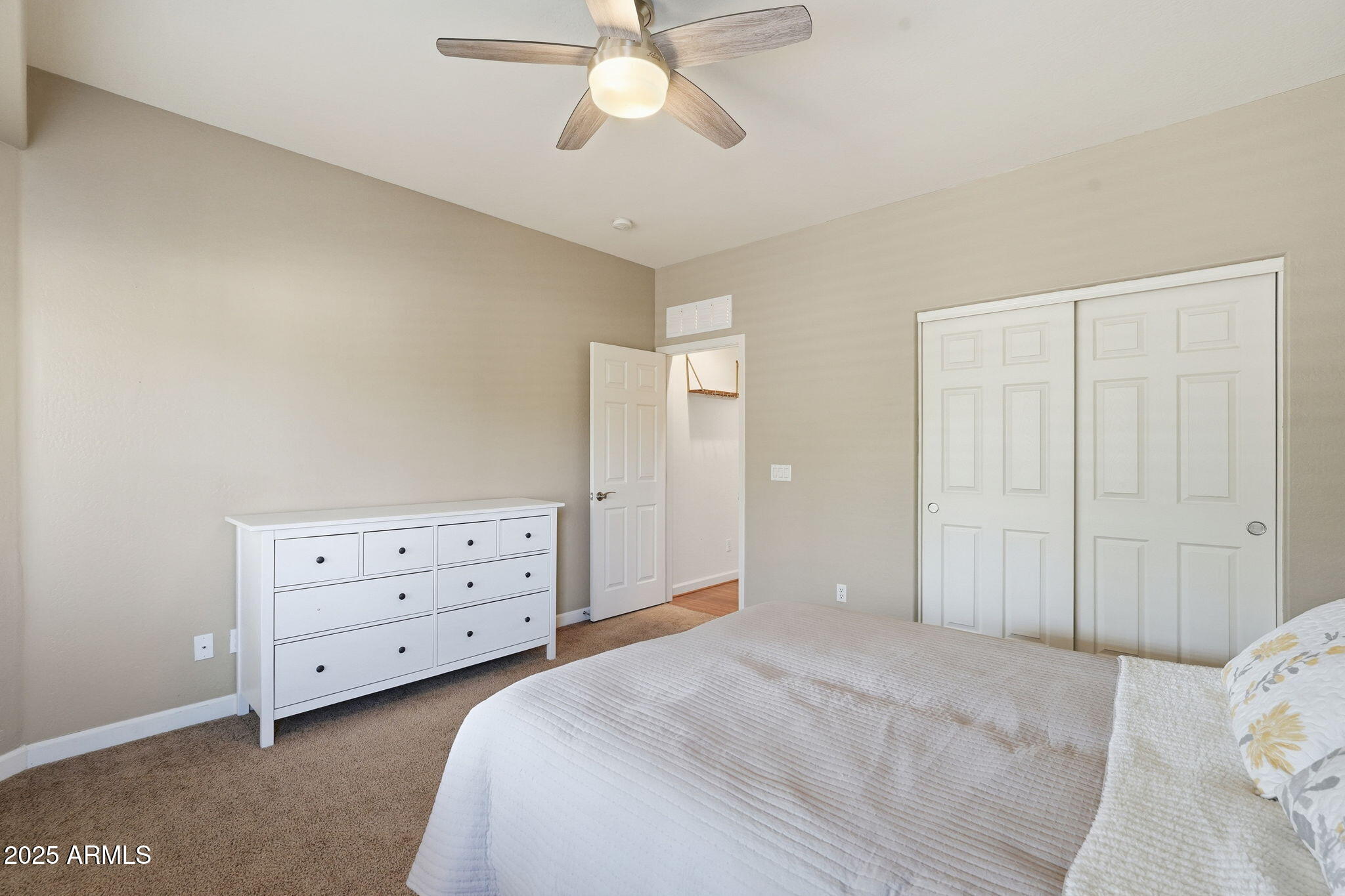 5161 North Scottsdale Road Eloy, AZ 85131 - Photo 29 of 58 a bedroom with a bed and a dresser
