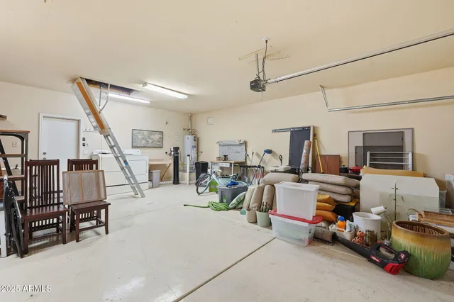 a view of a livingroom with furniture and a flat screen tv
