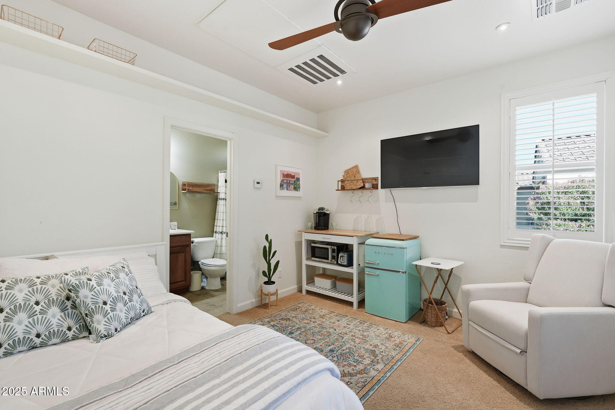 5161 North Scottsdale Road Eloy, AZ 85131 - Photo 6 of 58 a bedroom with a bed and a flat screen television