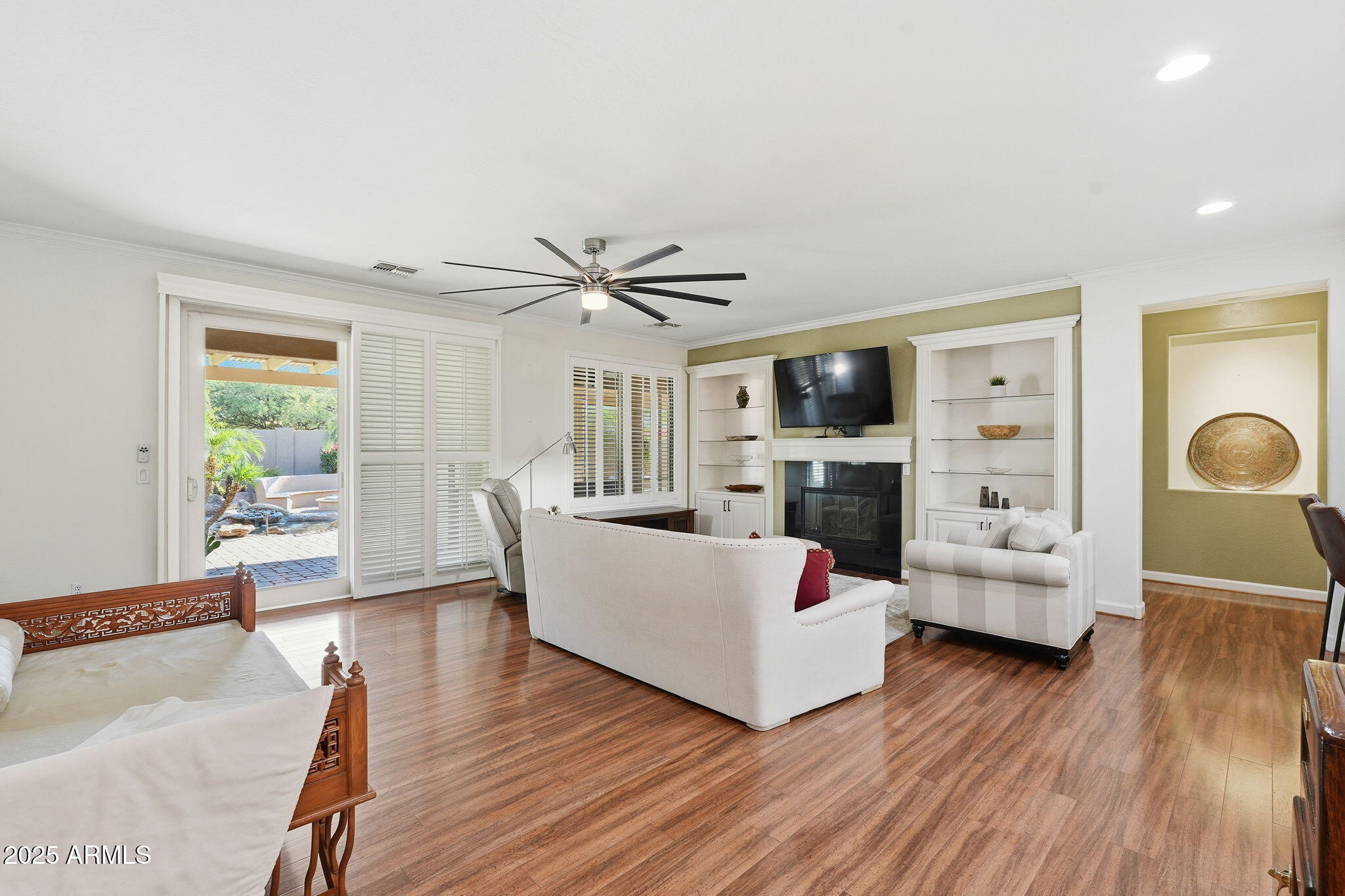 5161 North Scottsdale Road Eloy, AZ 85131 - Photo 9 of 58 a living room with furniture and a flat screen tv