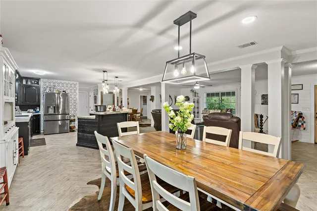 a view of a dining room with furniture