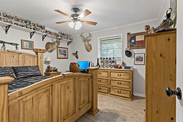 a view of a double vanity sink and a window