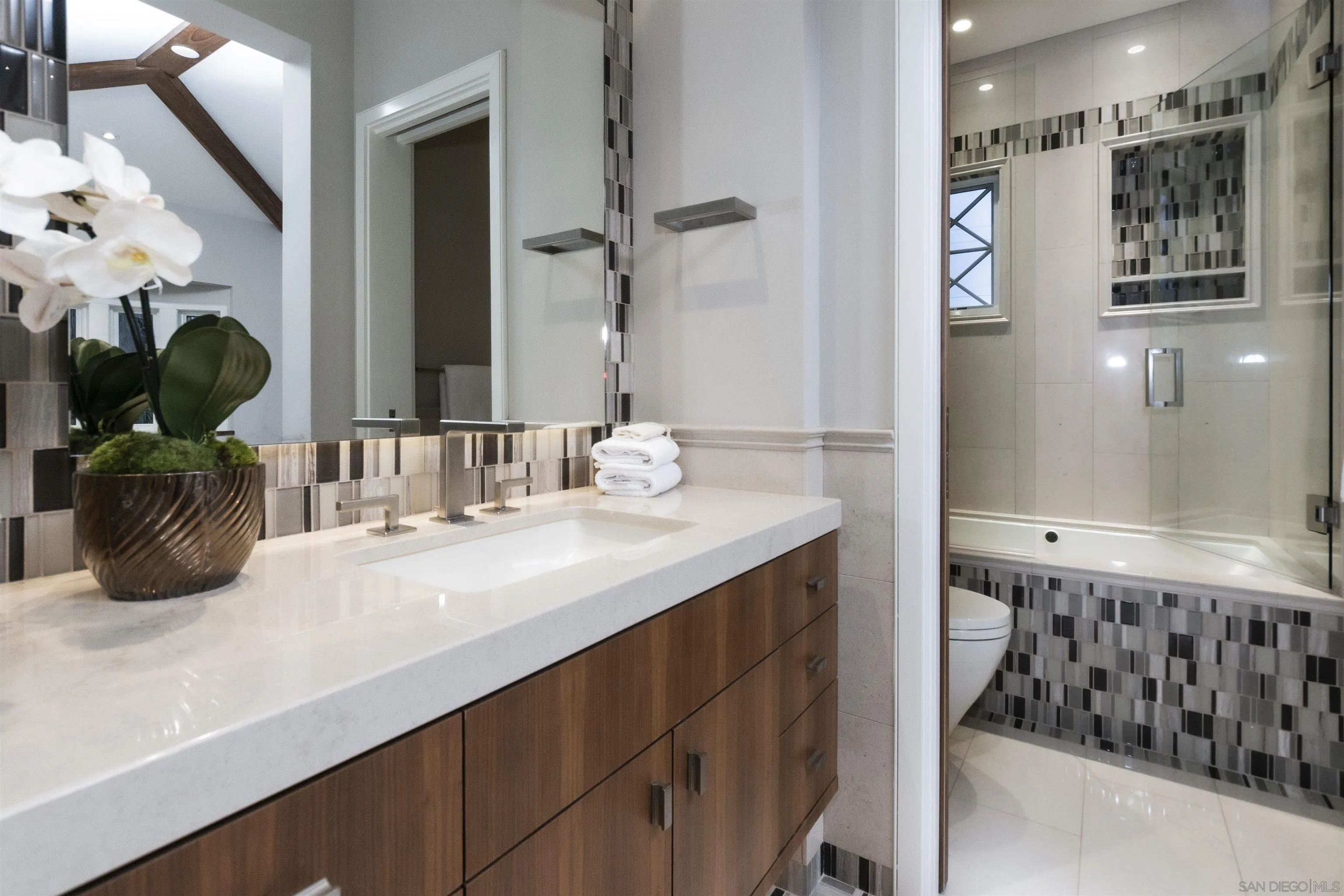 824 Neptune Avenue Encinitas, CA 92024 - Photo 30 of 33 a bathroom with a sink a double vanity and a mirror
