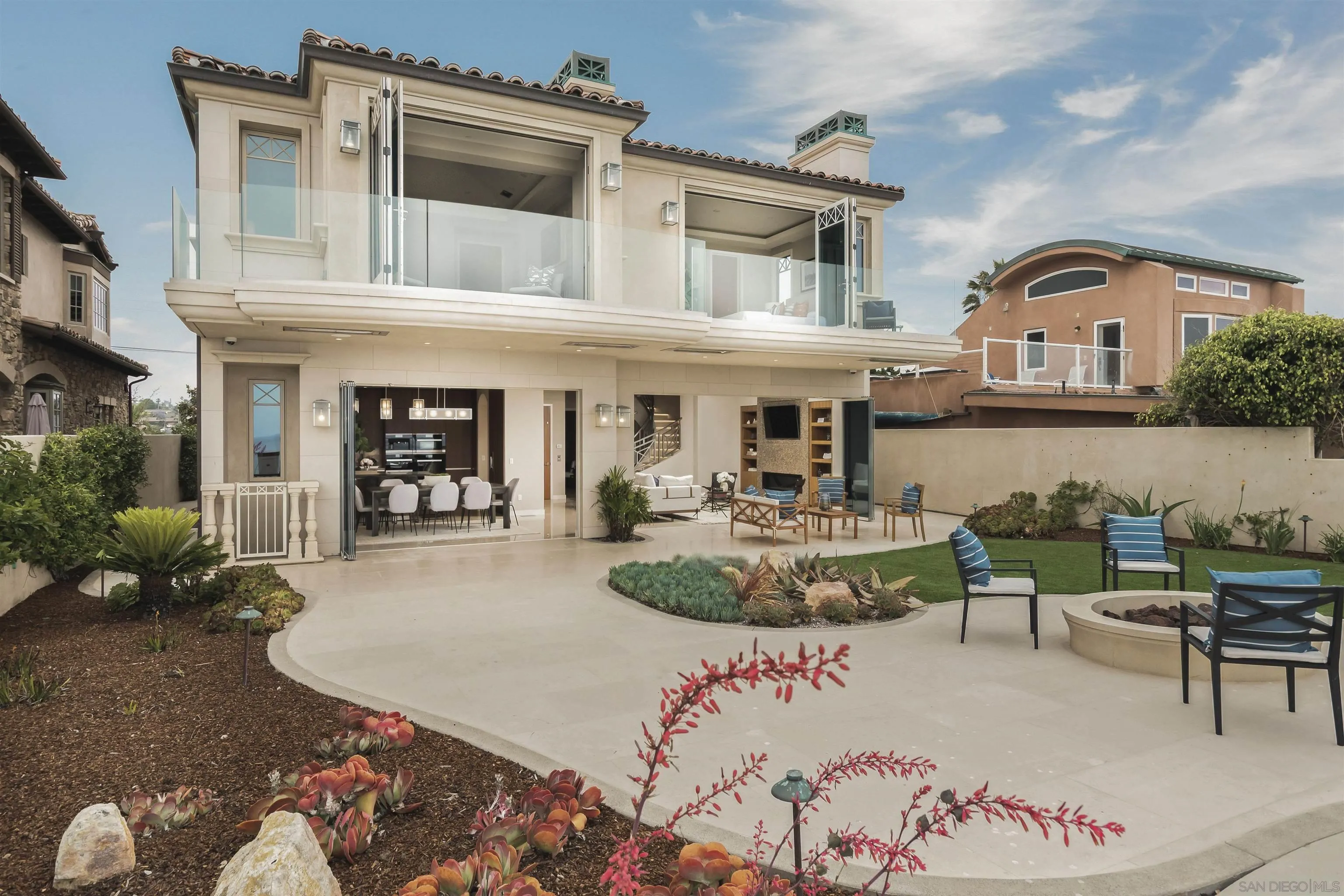 824 Neptune Avenue Encinitas, CA 92024 - Photo 32 of 33 a view of a white building with couches in front of it