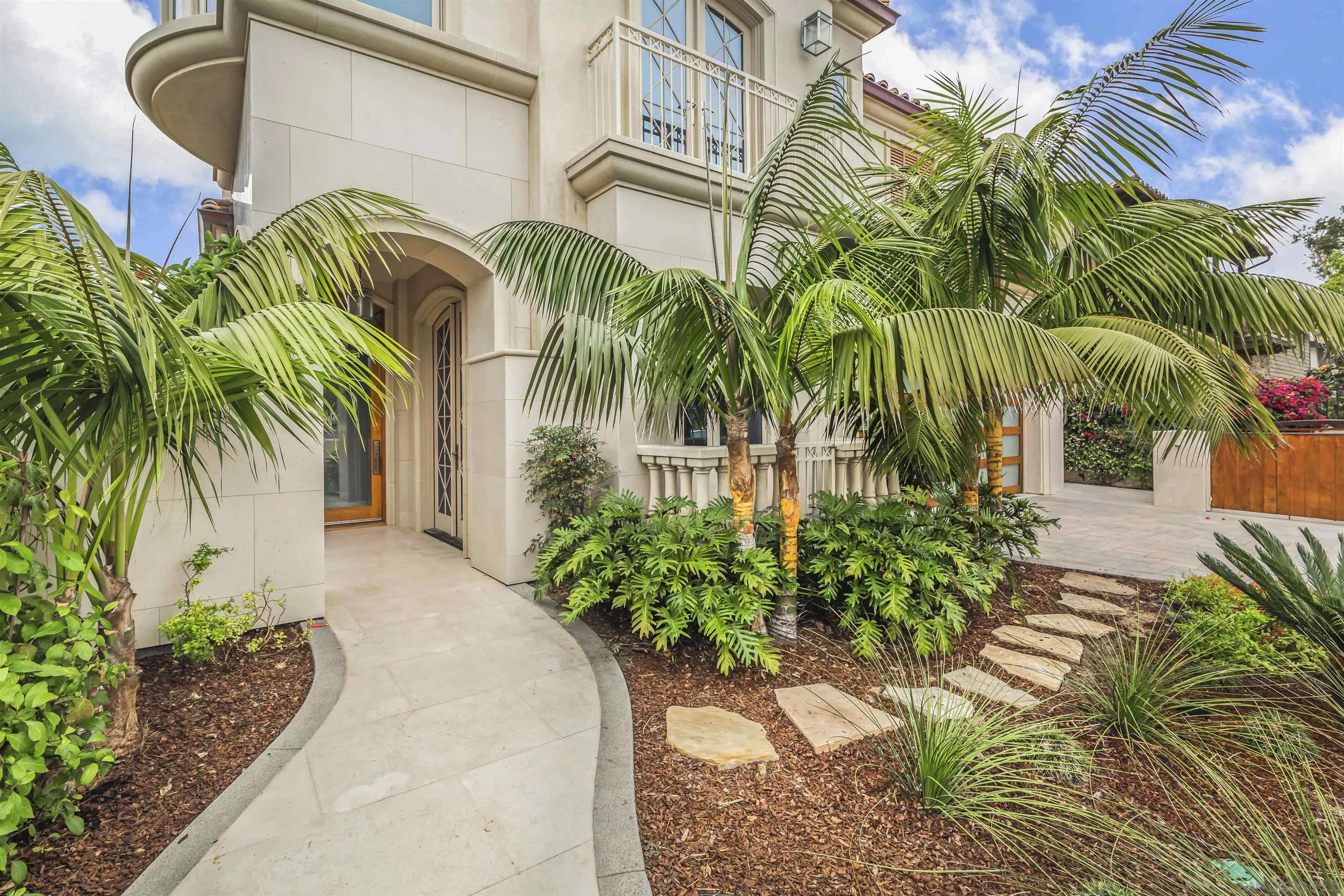824 Neptune Avenue Encinitas, CA 92024 - Photo 33 of 33 a couple of palm trees sitting in front of a house