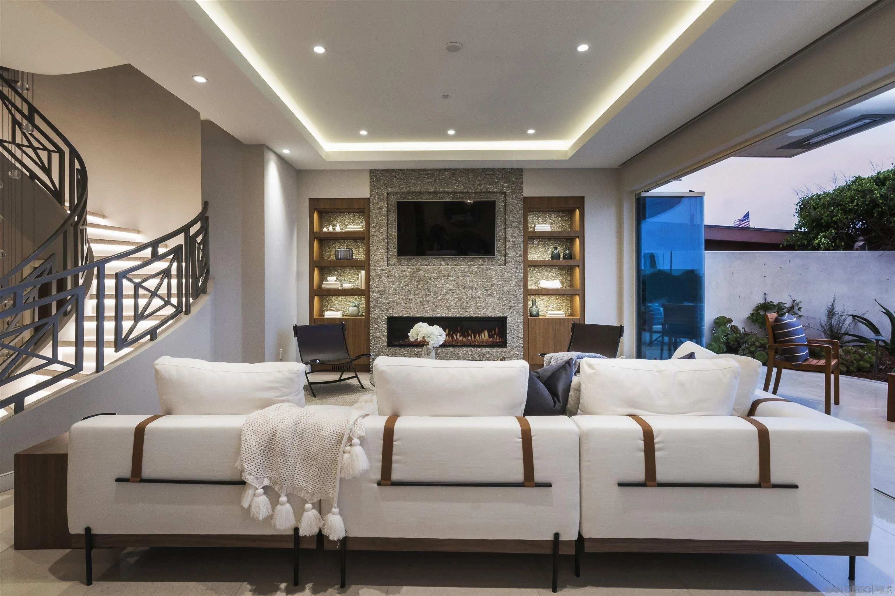 824 Neptune Avenue Encinitas, CA 92024 - Photo 4 of 33 a living room with furniture and a fireplace