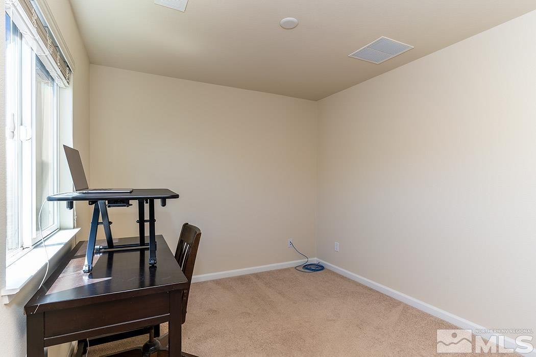 1863 Star Bright Way Reno, NV 89523 - Photo 12 of 22 a view of a room with furniture and window