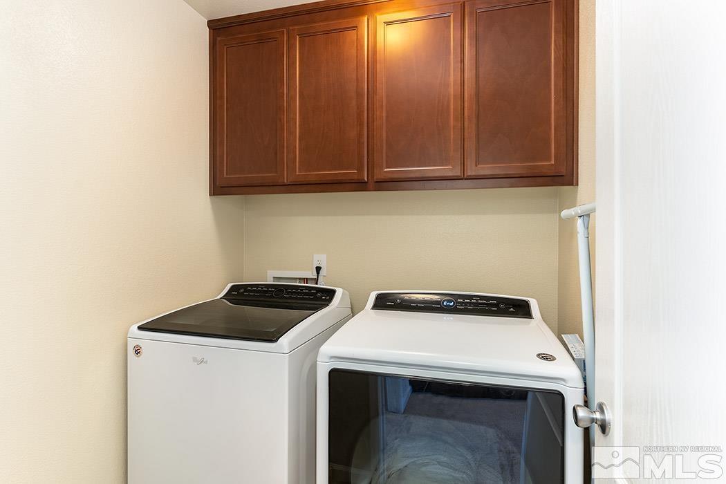 1863 Star Bright Way Reno, NV 89523 - Photo 16 of 22 a utility room with dryer and washer