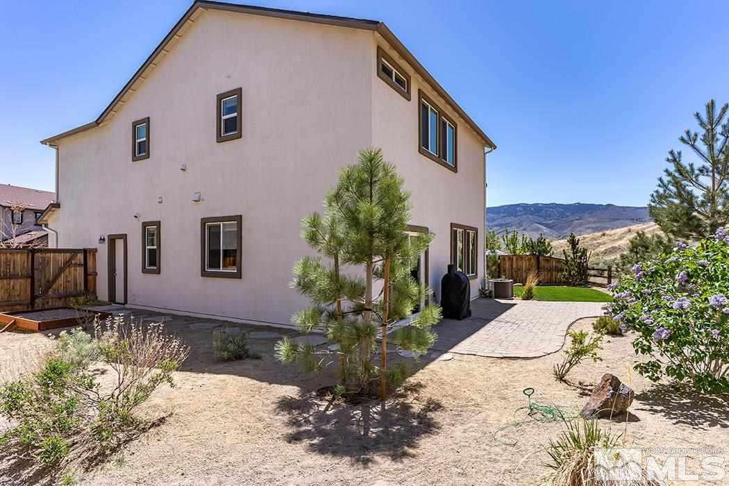 1863 Star Bright Way Reno, NV 89523 - Photo 18 of 22 a front view of a house with a yard