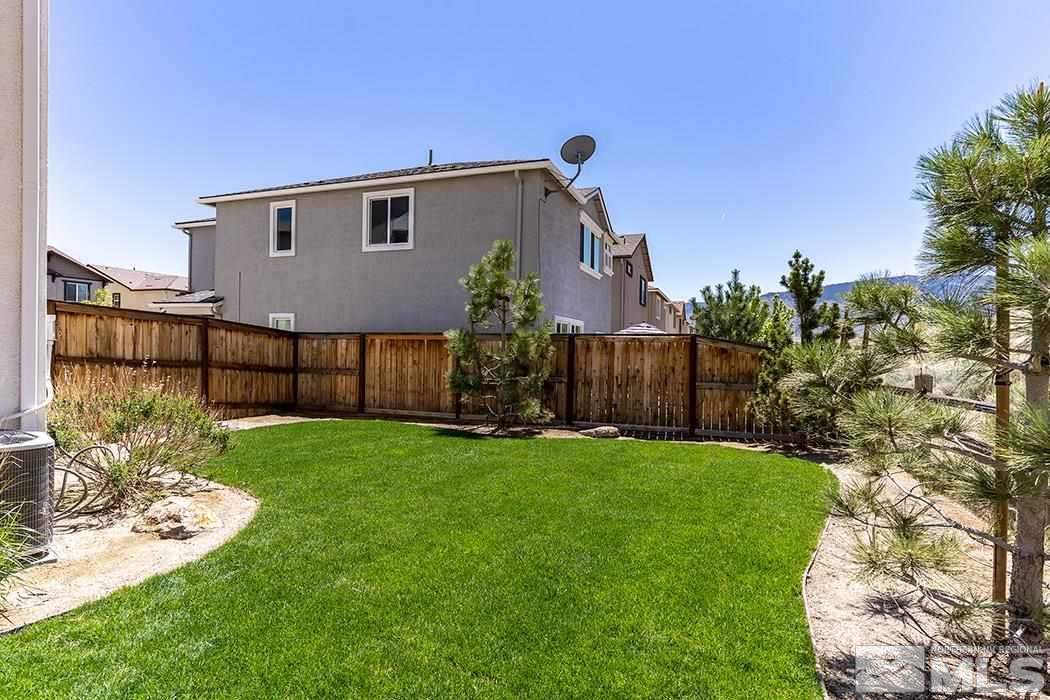 1863 Star Bright Way Reno, NV 89523 - Photo 21 of 22 a view of a house with backyard and garden