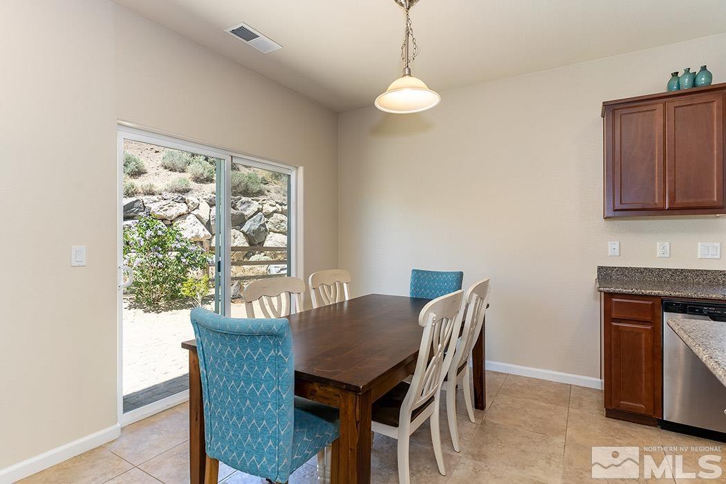 1863 Star Bright Way Reno, NV 89523 - Photo 5 of 22 a view of a dining room with furniture window and outside view