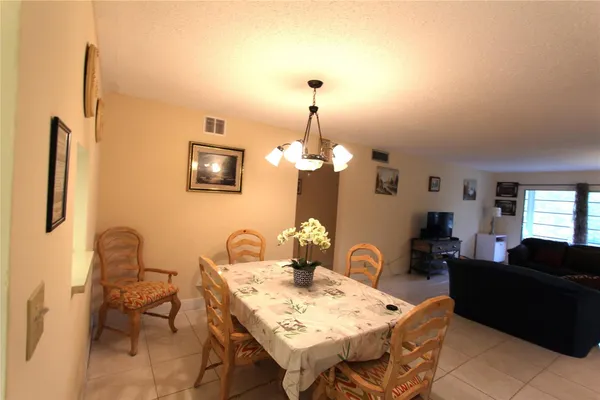 a view of a livingroom with furniture and window