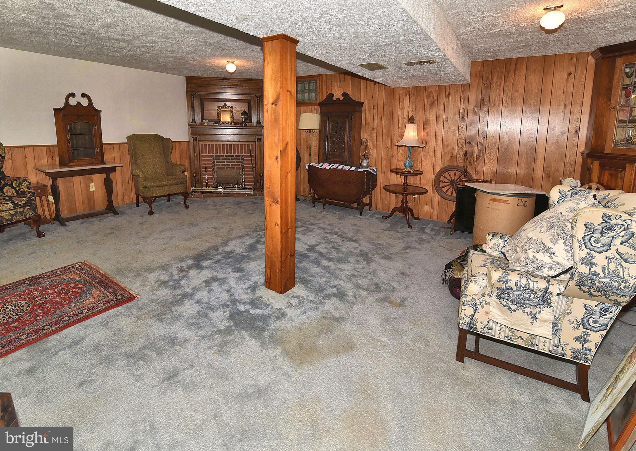 13600 Devonbrook Road Baldwin, MD 21013 - Photo 14 of 36 Lower level rec room with gas fireplace