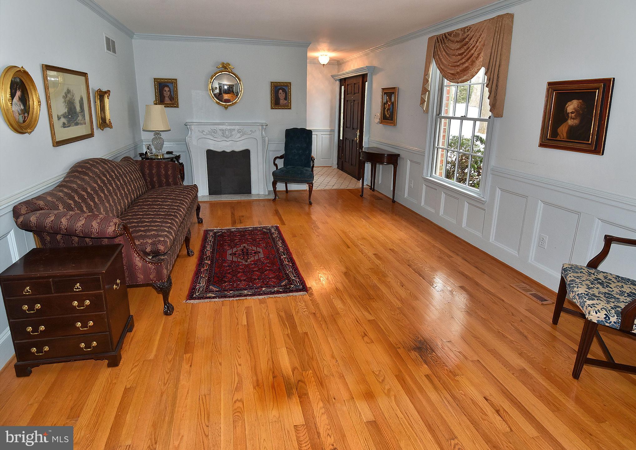 13600 Devonbrook Road Baldwin, MD 21013 - Photo 3 of 36 Large LR Hardwood floors decorative fireplace