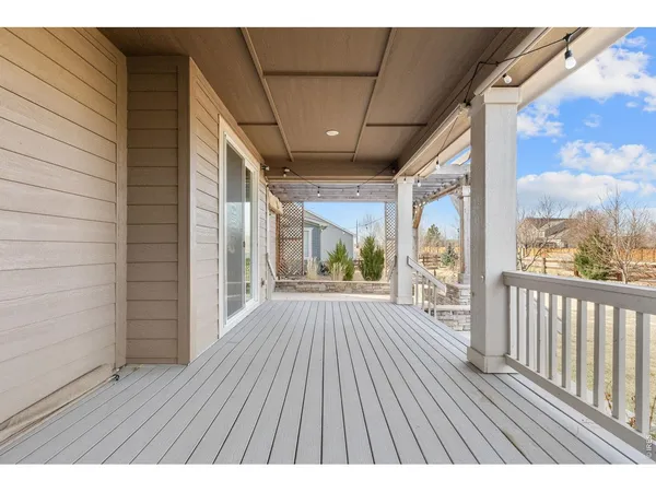a view of swimming pool with outdoor seating and a yard