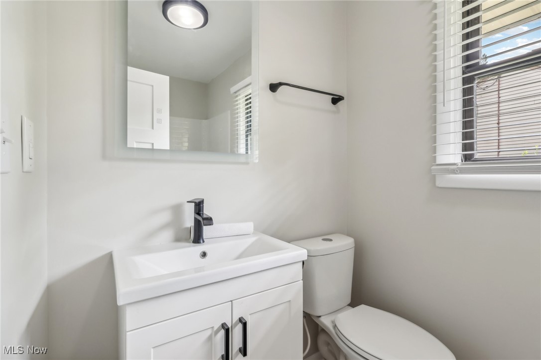 38 Rutledge Drive Youngstown, OH 44505 - Photo 12 of 32 Half bathroom with vanity and toilet