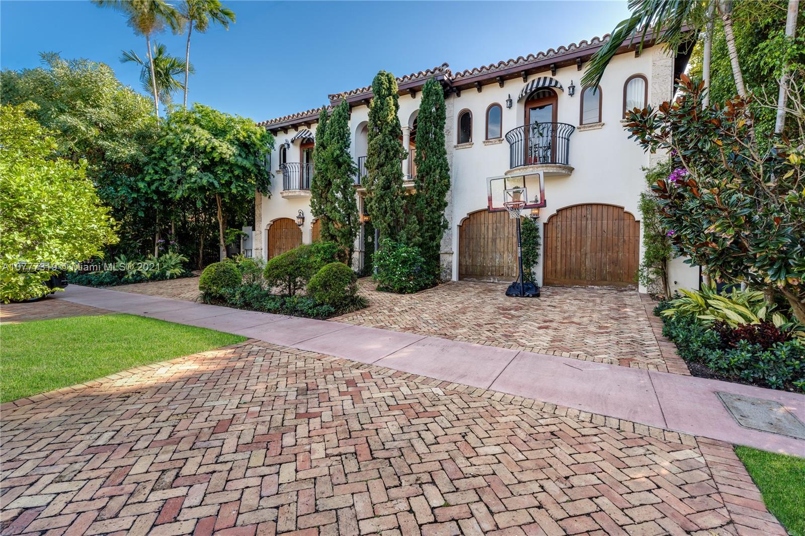 714 Lakeview Drive Miami Beach, FL 33140 - Photo 2 of 3 a front view of a house with garden