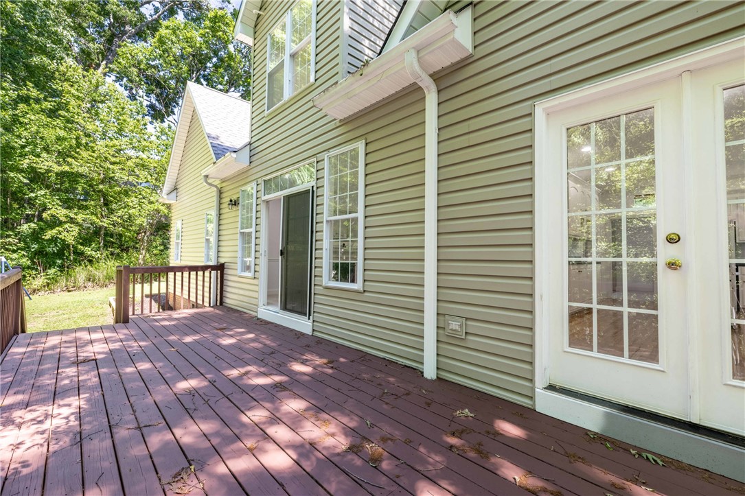 110 Brookstone Way Central, SC 29630 - Photo 18 of 46 This inviting outdoor space features a spacious wooden deck with direct access to the home.