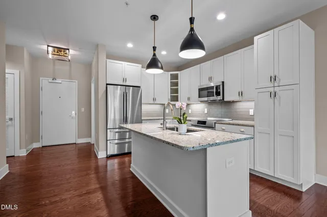 a living room with furniture and rug