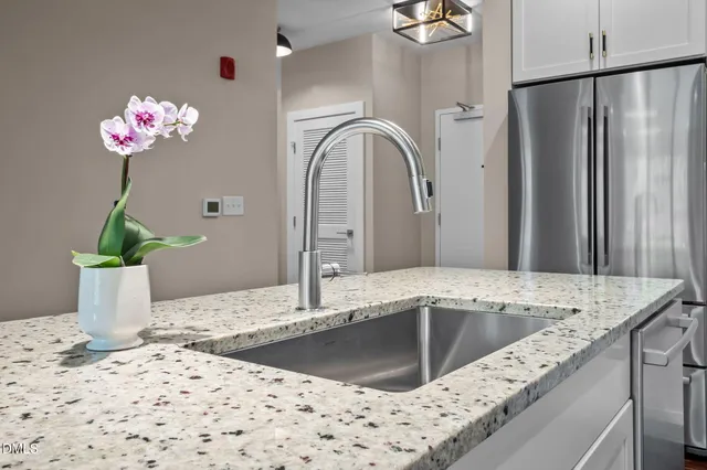 a view of a refrigerator and window