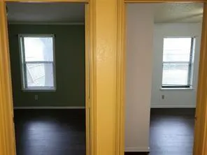 a view of a room that has a window in it