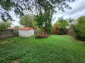 a fire hydrant in the middle of a field